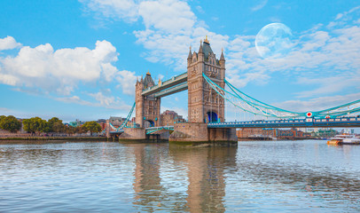 Fototapeta na wymiar Panorama of the Tower Bridge, Tower of London on Thames river with full moon - London, United Kingdom