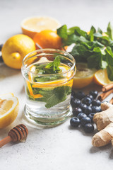 Mint and lemon drink and healthy ingredients for boosting immunity. Anti flu concept.