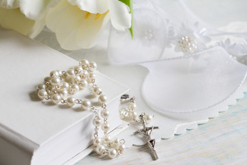 First communion baptism composition with christianity symbols and white tulips