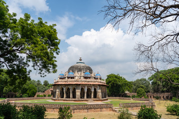 beautiful isa khan's tomb surrounded by its lush garden in delhi, india