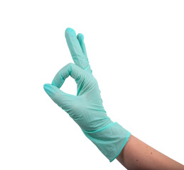 Green rubber glove on hand isolated on the white