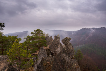 Fototapeta na wymiar Remains of rock city in Sulov Rocks, Súľov Rocks is a Slovak national nature reserve. Slovakia Sulovske Rocks High sandstone rocks in Sulov Rocks. Zilina region, Slovakia Sulovske Rocks.