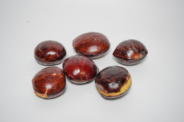 jengkol seeds with a white background