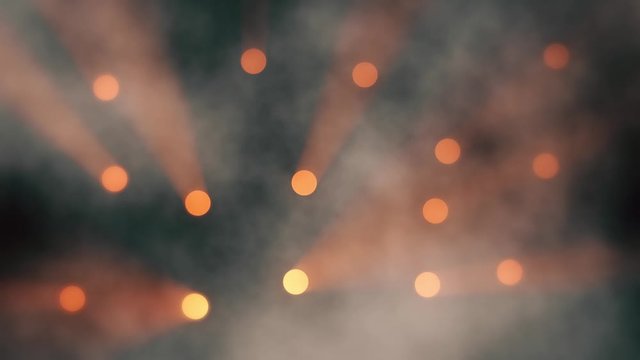 VJ Loop Orange Concert Lights with Rising Smoke and Volumetric Fog