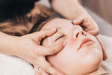 Fototapeta na wymiar Japanese Eye Rejuvenation Technique - Daily Shiatsu Massage