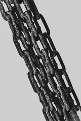 human hands in iron chains
