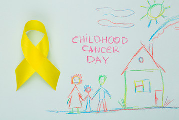 Obraz premium Yellow ribbon, Childhood Cancer Awareness Month. Children healthcare background with child's drawing