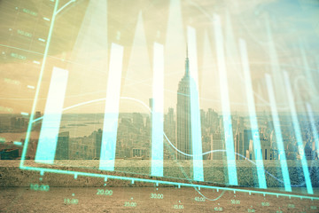 Forex graph on city view with skyscrapers background multi exposure. Financial analysis concept.