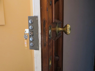 Obraz premium huge lock on a frontdoor to keep inhabitans save