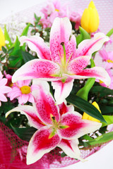 bouquet of natural large pink lilies, chrysanthemums and tulips