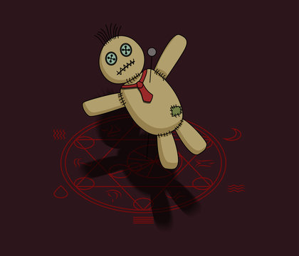 Voodoo doll pierced with pin lying on magic circle