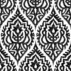 Embroidered black and white seamless damask pattern. Elegant print for textiles. Handmade in a bohemian style. Vector illustration.