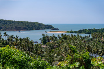 aerial panoramic view over the lush rich farm lands and backwaters of goa, india