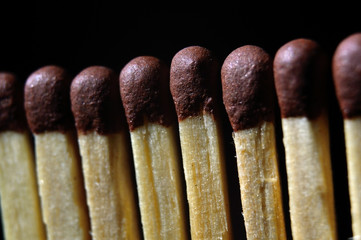 match heads on a black background close-up.