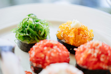 Seaweed nigiri sushi serving on a plate