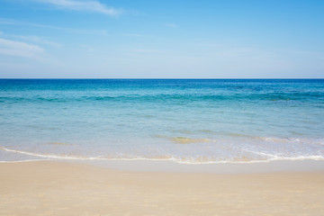 Fototapeta na wymiar Gentle aqua blue sea waves on a sunny day with copy space. Phuket, Thailand