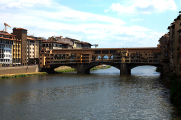 Fototapeta na wymiar Firenze, Italy - April 21, 2017: View of Ponte Vecchio and Arno River, Florence, Firenze, Tuscany, Italy
