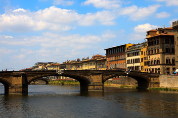 Fototapeta premium Firenze, Italy - April 21, 2017: Ponte alla Carraia and Arno river, Florence, Firenze, Tuscany, Italy