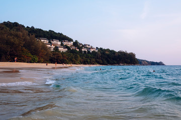 Waves at sunrise at Nai Thon Beach in Phuket, Thailand