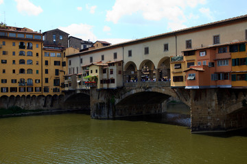Fototapeta na wymiar Firenze, Italy - April 21, 2017: Ponte Vecchio and Arno River, Florence, Firenze, Tuscany, Italy
