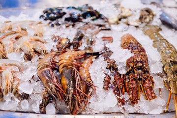 Fresh seafood and prawns on ice in Thailand