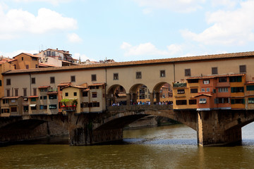 Fototapeta na wymiar Firenze, Italy - April 21, 2017: Ponte Vecchio and Arno River, Florence, Firenze, Tuscany, Italy