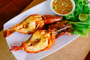 Grilled jumbo Prawns on a plate in restaurant