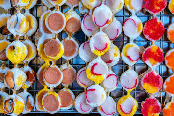 Fried quail egg sticks in Thai style recipe. This snack is among the most popular in street food of Thailand, close up