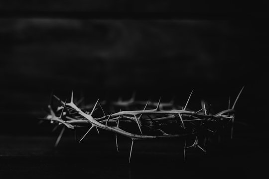 Black and white  of  the crown of thorns of Jesus on  wooden background with copy space, can be used for Christian background, Easter concept