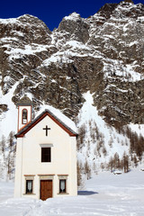 Devero Park ( Verbano-Cusio-Ossola ), Italy - January 15, 2017: The church in Crampiolo village at Alpe Devero Park, Ossola Valley, VCO, Piedmont, Italy