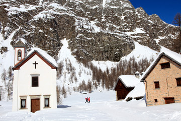 Devero Park ( Verbano-Cusio-Ossola ), Italy - January 15, 2017: The church in Crampiolo village at Alpe Devero Park, Ossola Valley, VCO, Piedmont, Italy