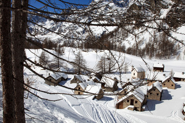 Devero Park ( Verbano-Cusio-Ossola ), Italy - January 15, 2017: Crampiolo village and houses in Alpe Devero Park, Ossola Valley, VCO, Piedmont, Italy