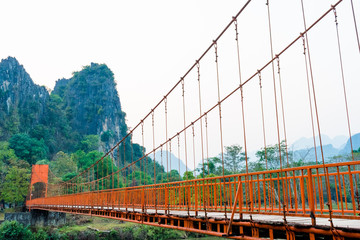 Orange bridge over song river Landmark in Vang Vieng,Laos 