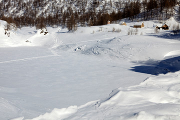 Devero Park ( Verbano-Cusio-Ossola ), Italy - January 15, 2017: The Codelago iced lake in Alpe Devero Park, Ossola Valley, VCO, Piedmont, Italy
