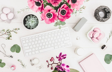 Spring themed creative workplace, desk top, anemones, magenta colors © FloweretteLV