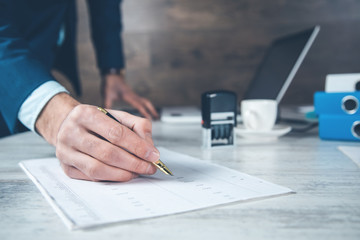 man hand pen with document