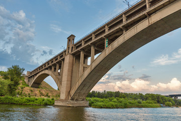 Fototapeta na wymiar Preobrazhensky bridge over the Dnieper river in Zaporizhia, Ukraine.
