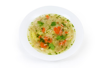 Chicken soup with thin short vermicelli in the white dish