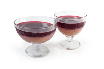 Fruit and milk gelatin dessert in glass ice cream cups