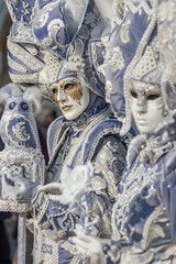 Blue masks at the Venice carnival