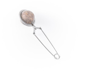 Tea strainer or infuser- filter isolated on white