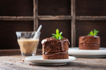 Chocolate mini cake on the wooden table