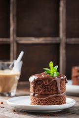 Chocolate mini cake on the wooden table