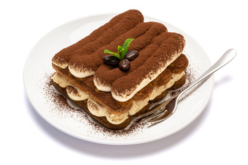 Classic tiramisu dessert on ceramic plate isolated on white background with clipping path