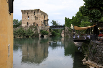 Borghetto (VR),  Italy - April 30, 2017: Mincio river in Borghetto village, Mincio, Verona, Veneto, Italy