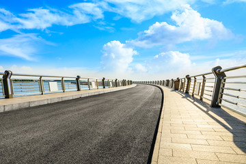 Asian bridge asphalt road and river nature landscape in summer