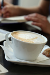 Restaurant. Coffee cup on the table