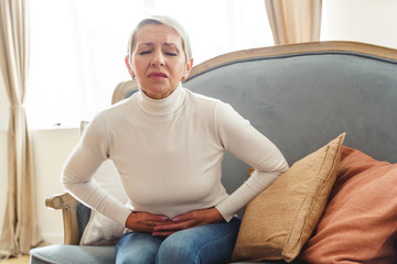 Aged lady writhing in an abdominal pain