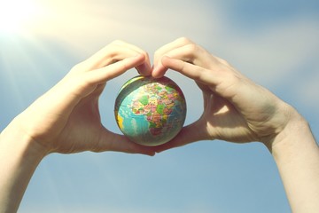 Earth globe in Hands
