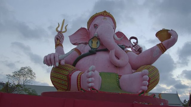 .Ganesha lord of success in sunrise..Ganesha Hindu God and the god of success in  Makha Bucha Buddhist memorial park at Nakornnayok province Thailand